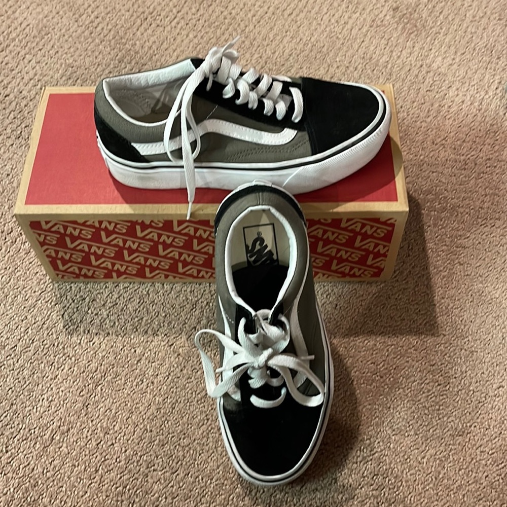 Vans womens size 6 Mens size 4.5. Black and olive green.